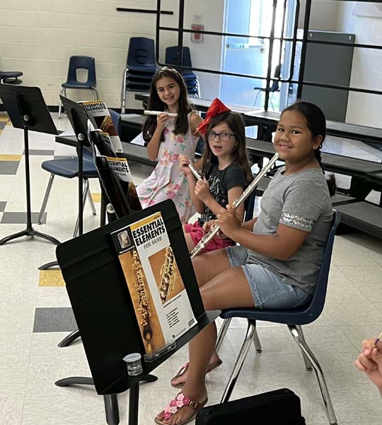 students playing instruments