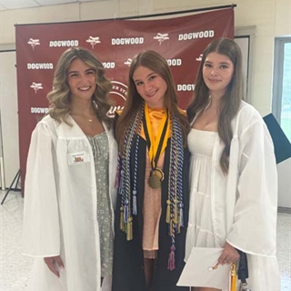 teacher and students smiling