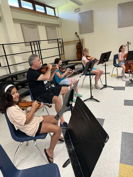 students playing instruments