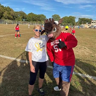 Teacher and mascot