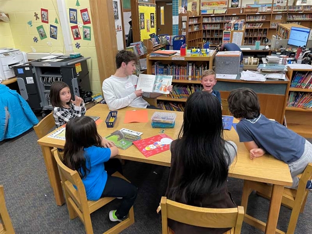 Students reading in the library