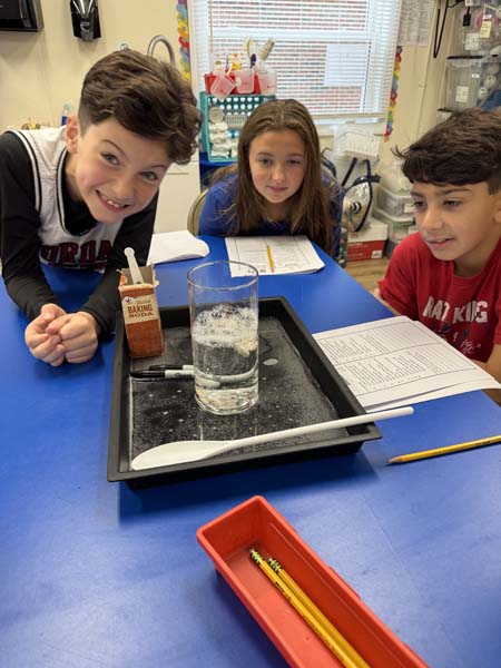 students working on a science project