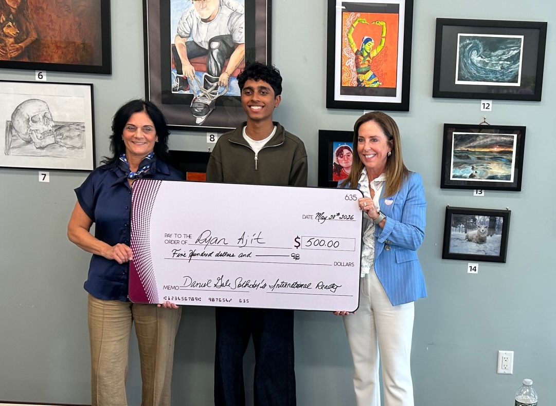 group photo with a check