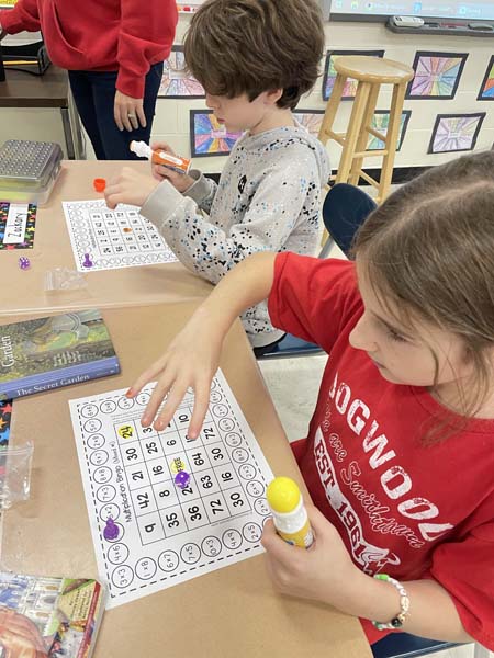 Students practicing STEAM lessons