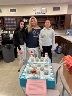 students with cupcakes