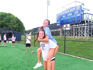 Students doing piggyback ride