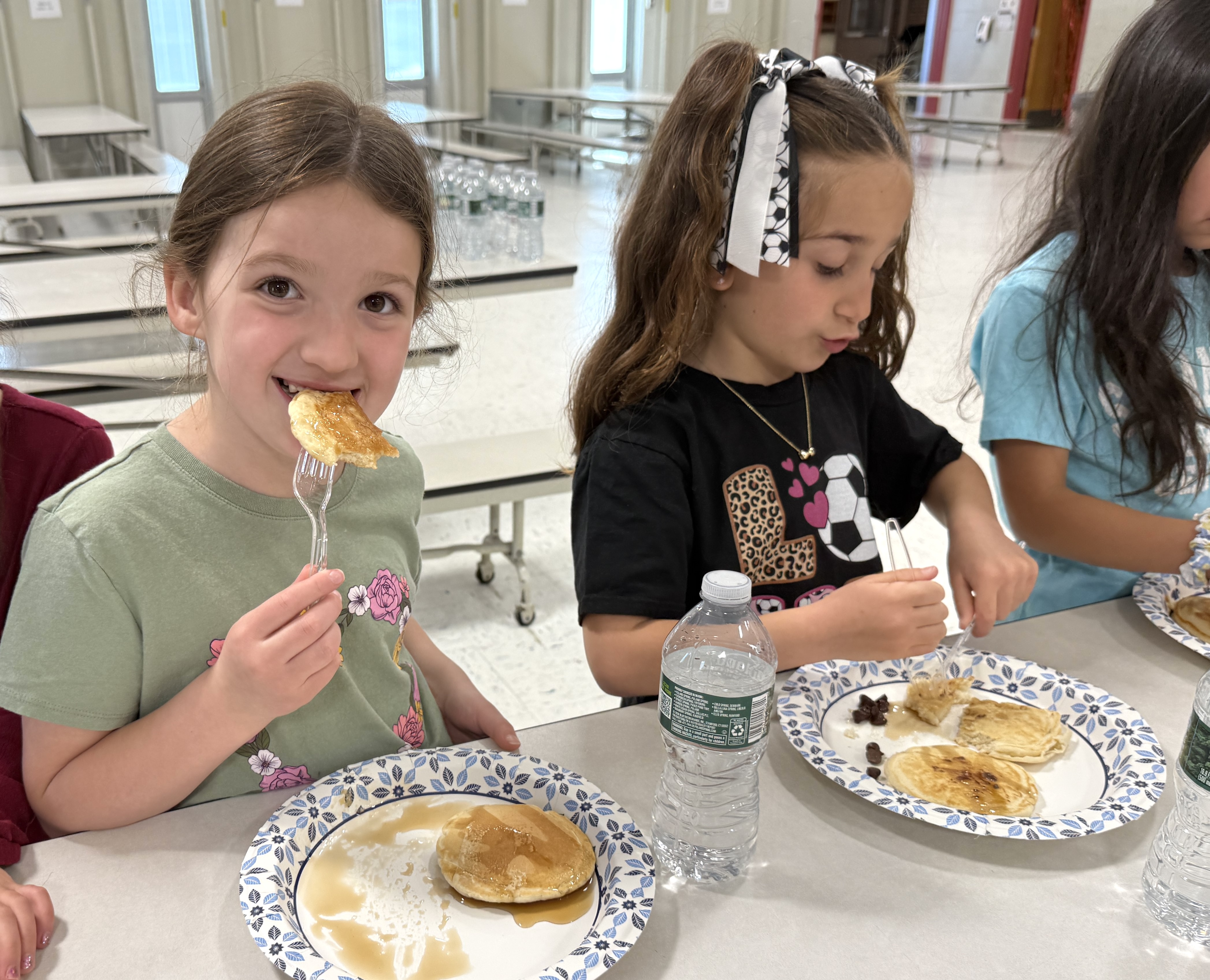 Student eating pancake
