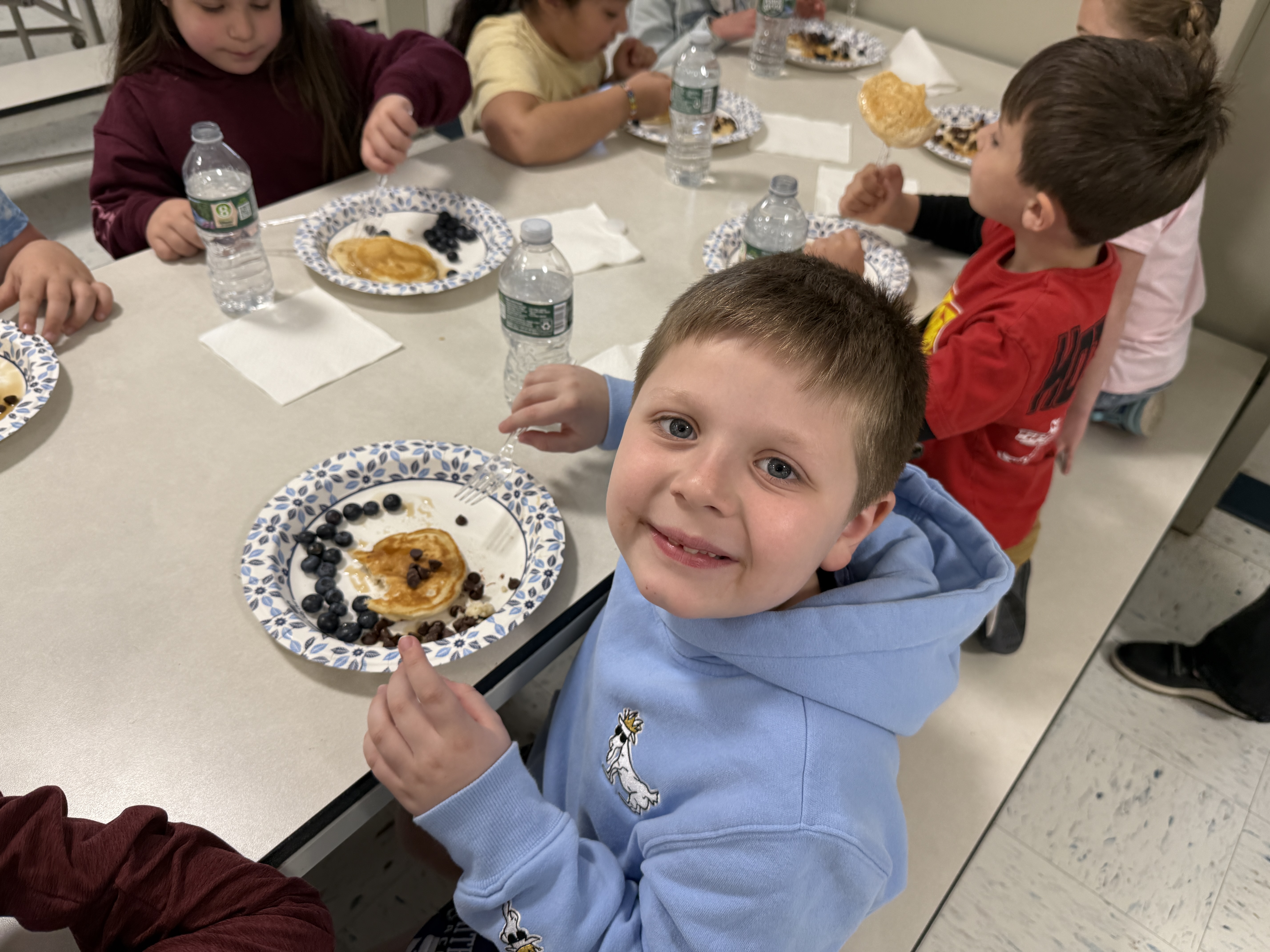 Student eating pancake