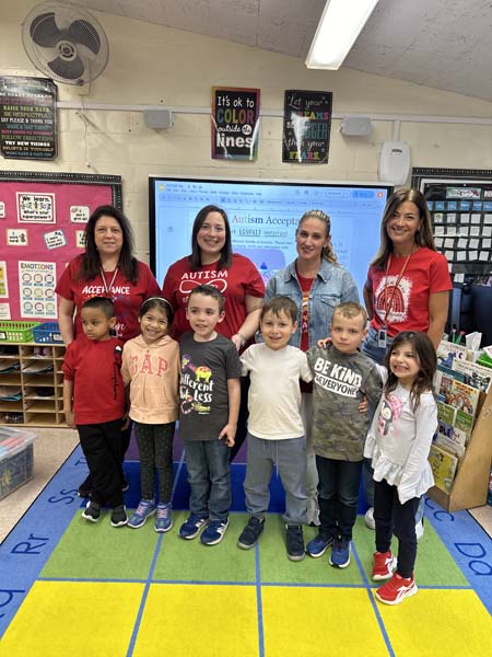 Students and staff posing for a picture