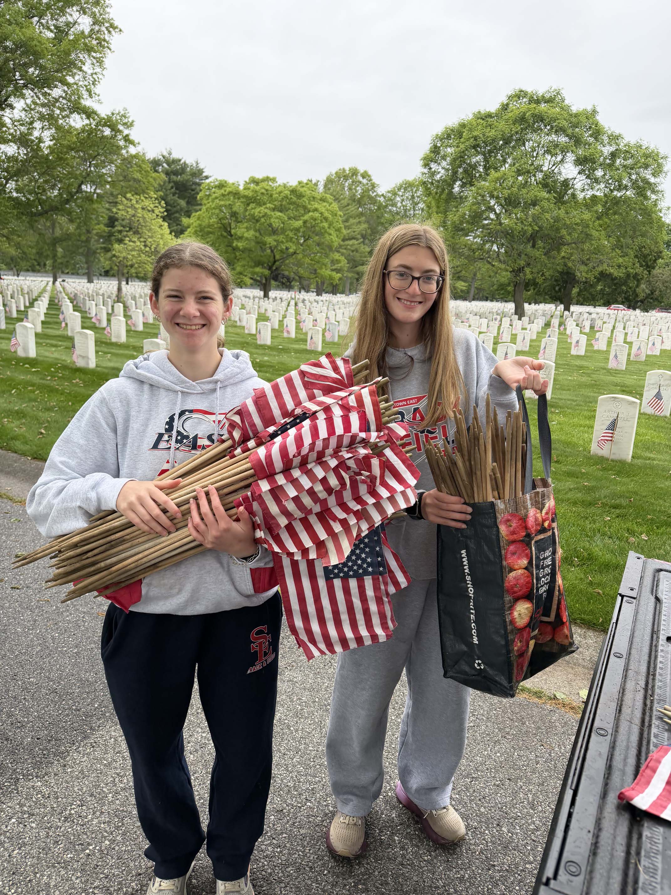 students holding flags