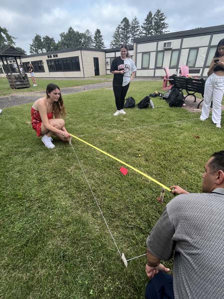 students conducting science experiment