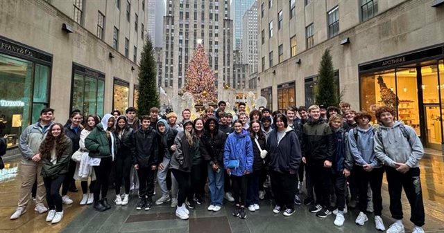 Students posing for picture in NYC
