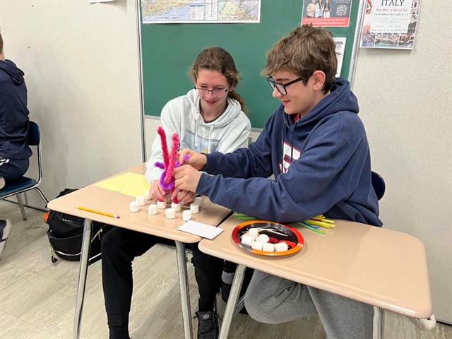 students making handmade skyscrapers