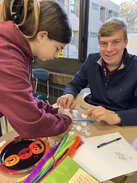 students making handmade skyscrapers