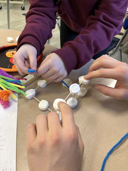 students making handmade skyscrapers