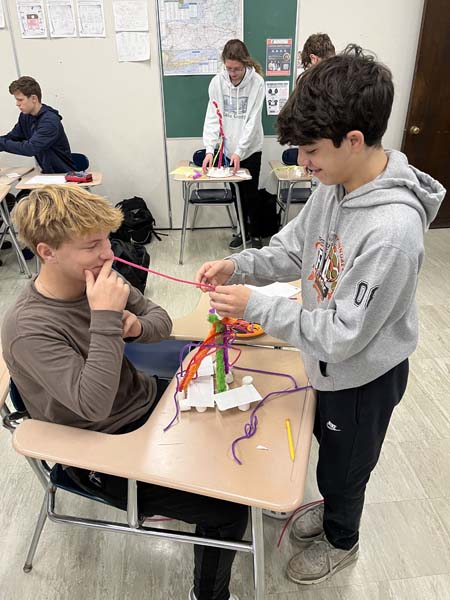 students making handmade skyscrapers