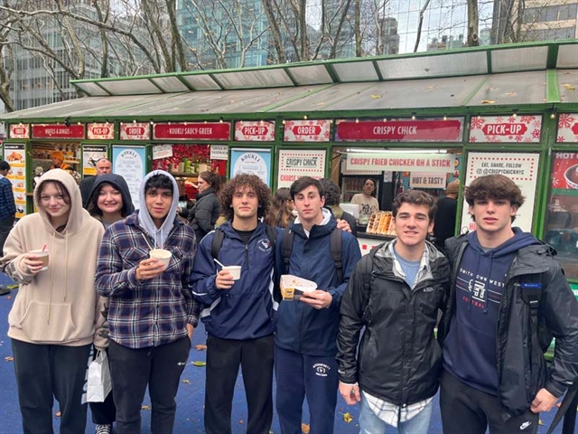 Students posing for picture in NYC