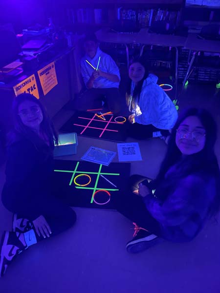 students playing glow in the dark game