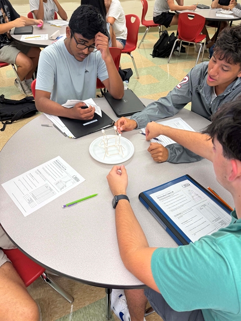 students at table working