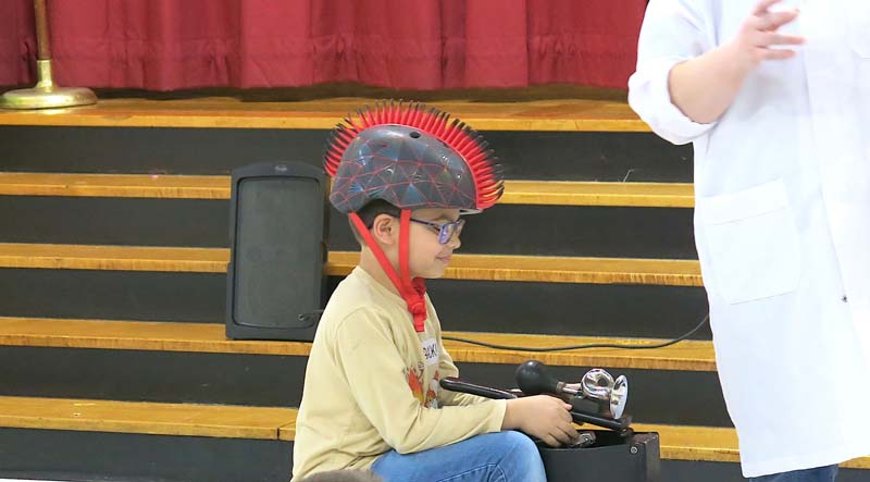 student wearing helmet