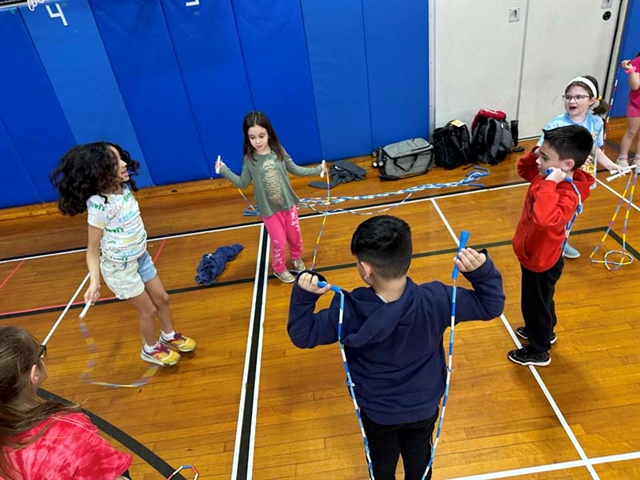 students jump roping