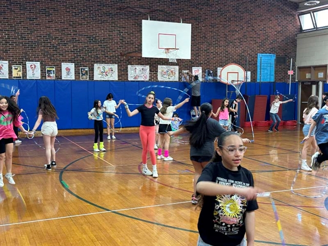 students jump roping