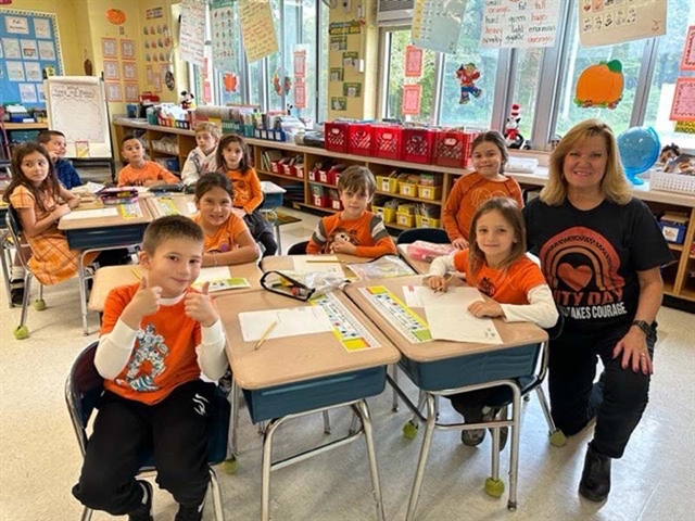 Students wearing orange