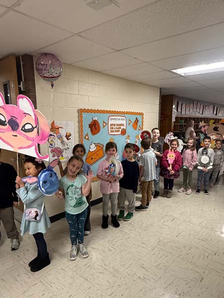 Children walking through halls