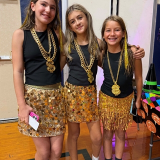 students dressed in halloween costumes