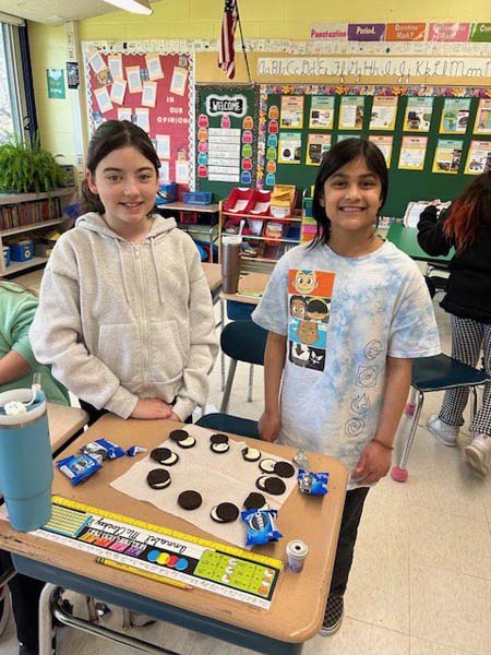 students in class smiling