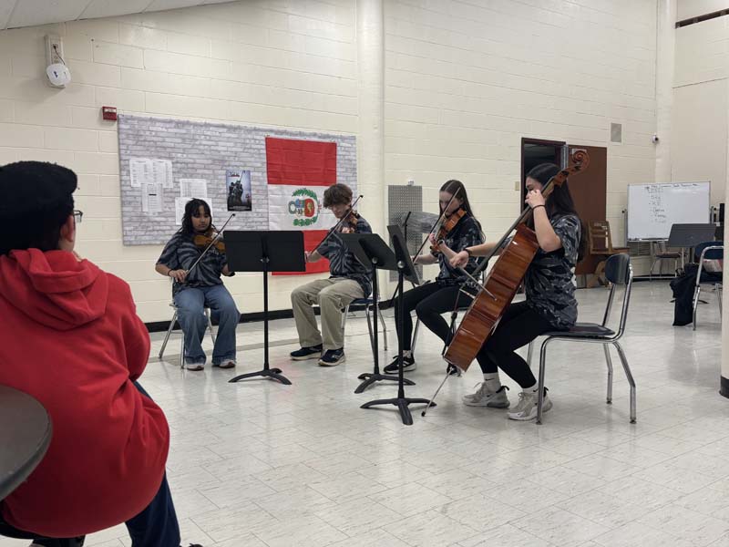 students playing music