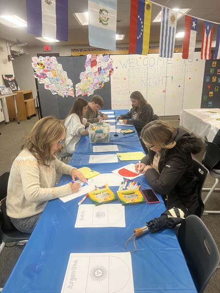 People working on a project at a table