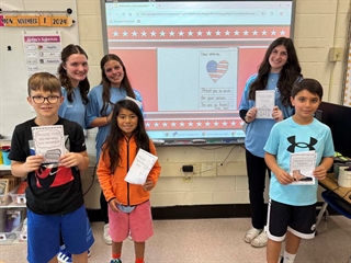 High School leadership and elementary students