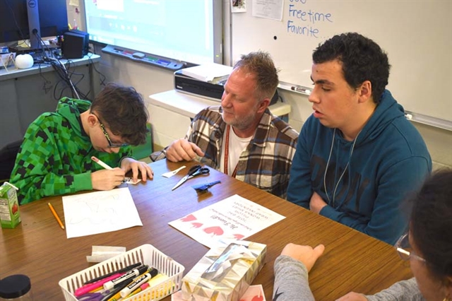 Students working on Valentine's Day project