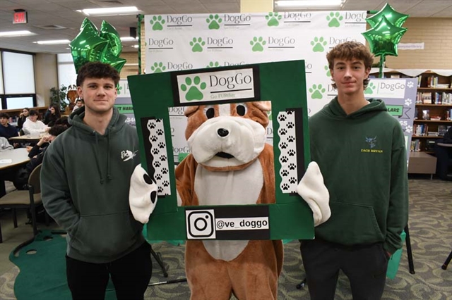 Students and mascot in open house