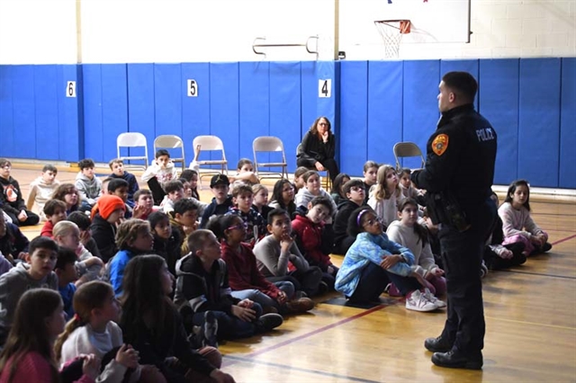 Officer Allison speaking to students