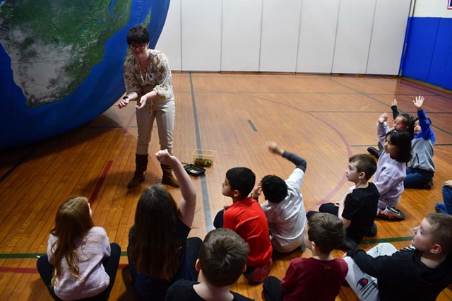 Students listening to instructor