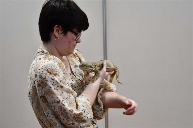 Instructor with bearded dragon