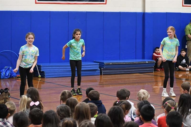 students performing a dance routine