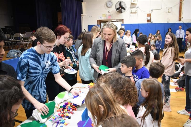 Stephanie O'Brien making puppets