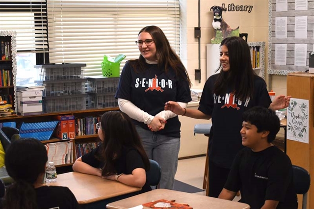 HSW students teaching different languages to elementary students