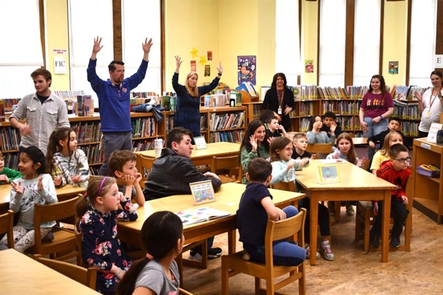 Mr. Leifsson and students watching