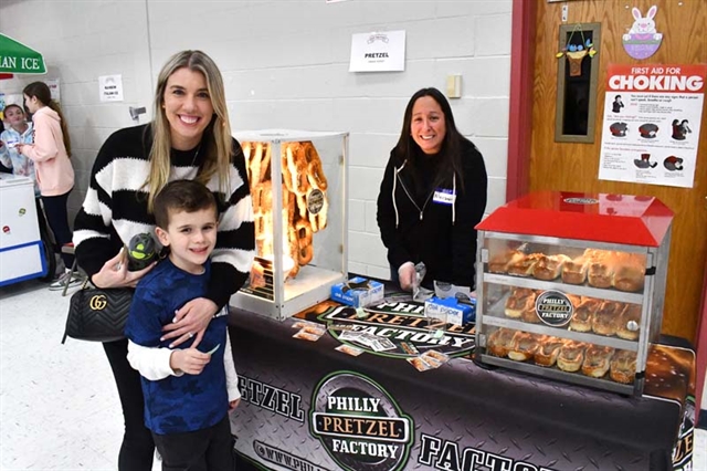 Parents and students smiling