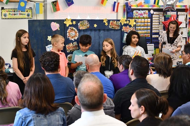 children performing in class