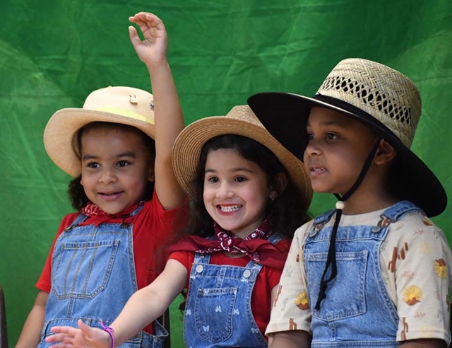 children waiving