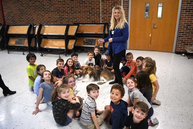 therapy dog with students