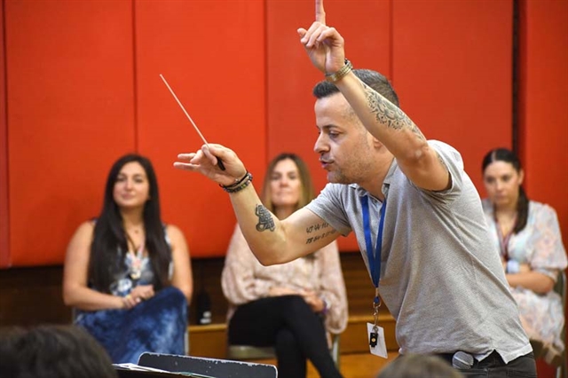 Music teacher conducting