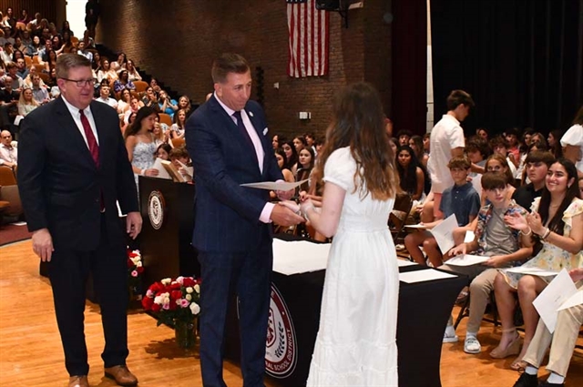 Student receiving diploma