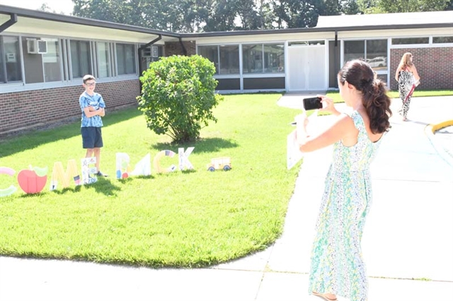 Mother taking picture