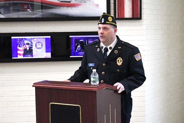 HSE teacher speaking at ceremony